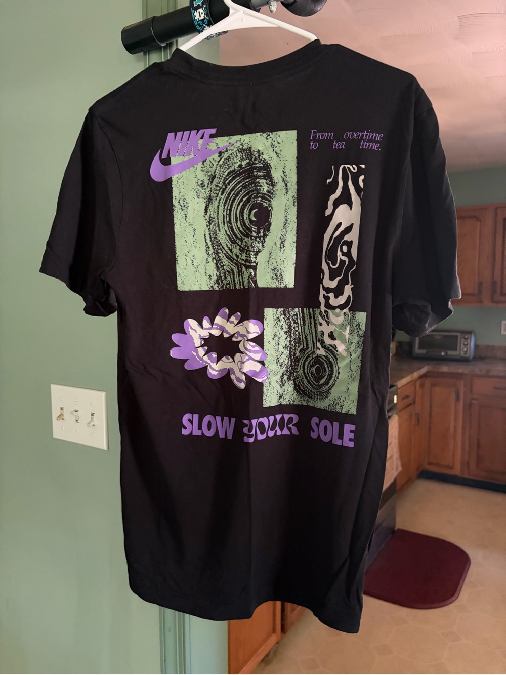 Nike Black Short-Sleeve Graphic Tee with Purple & Green Accents